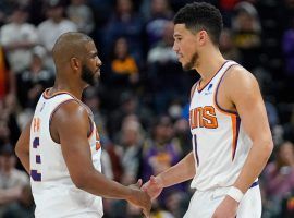 Chris Paul and Devin Booker from the Phoenix Suns are finally getting respect from oddsmakers with the most recent adjustment in their championship odds. (Image: Getty)