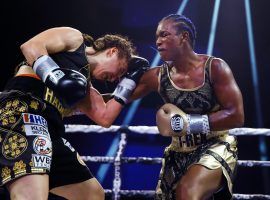 Claressa Shields (right) comes in as a heavy favorite in her middleweight title defense against Ema Kozin on Saturday night in Wales. (Image: Matt Rourke/AP)