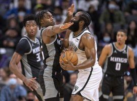 James Harden from the Brooklyn Nets is harassed by rookie Davion Mitchell of the Sacramento Kings. (Image: Sergio Estrada/USA Today Sports)