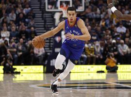 Michael Porter, Jr from the Denver Nuggets dribbles in transition against the Utah Jazz last season. (Image: Jeff Swinger/Getty)