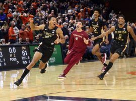 Matthew Cleveland is chased by his teammates at Florida State after he hit a buzzer beater to defeat Virginia at John Paul Jones Arena. (Image: USA Today Sports)