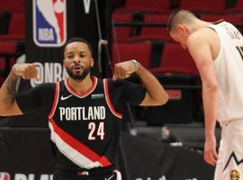Norman Powell flexes after hitting a 3-point shot for the Portland Trail Blazers against the Denver Nuggets. (Image: Jaime Valdez/USA Today Sports)