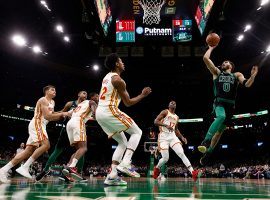 Jayson Tatum from the Boston Celtics takes an uncontested shot during a 38-point performance against the Atlanta Hawks to keep their winning streak alive. (Image: Winslow Townsend/AP)
