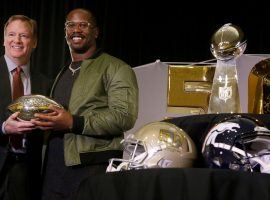 Von Miller accepts the Pete Rozelle Super Bowl MVP Trophy from commissioner Roger Goodell in Super Bowl 50. (Image: Getty)