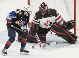 The United States and Canada will likely face off yet again for the gold medal in women’s hockey at the 2022 Winter Olympics in Beijing. (Image: Jessica Hill/AP)