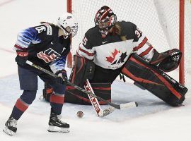 The United States and Canada will likely face off yet again for the gold medal in womenâ€™s hockey at the 2022 Winter Olympics in Beijing. (Image: Jessica Hill/AP)