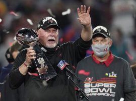 Bruce Arians hoists the Lombardi trophy after the Tampa Bay Bucs won Super Bowl 55. (Image: AP)