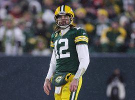 Aaron Rodgers stayed with the Green Bay Packers for $200 million, and they saw a huge surge in their Super Bowl 57 odds. (Image: Getty)