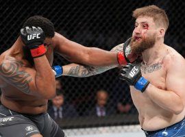 Curtis Blaydes (left) surprised many by using his standup striking to beat Chris Daukaus (right) in the main event of UFC Fight Night 205. (Image: Josh Hedges/Zuffa)