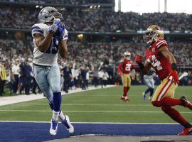 Amari Cooper catches a touchdown pass for the Dallas Cowboys against the San Francisco 49ers in the NFC Wild Card round. (Image: Tim Heitman/USA Today Sports)