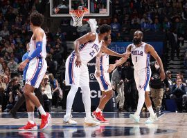 Joel Embiid from the Philadelphia 76ers congratulates teammate James Harden on hitting a bucket. (Image: David Sherman/Getty)