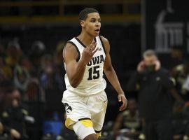 Keegan Murray from Iowa celebrates a 3-pointer against Purdue. (Image: Getty)