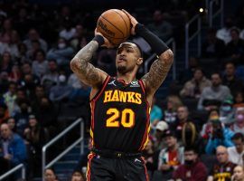 John Collins from the Atlanta Hawks shoots a free throw against the LA Clippers. (Image: Nick Wass/AP)