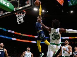 The high-flying Ja Morant from the Memphis Grizzlies elevates for a dunk against the Boston Celtics. (Image: Getty)