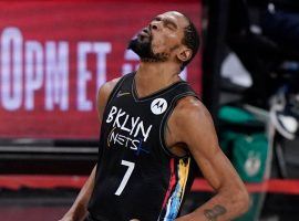 Kevin Durant from the Brooklyn Nets winces in pain after getting fouled in a game against the Milwaukee Bucks in the 2020 NBA Playoffs. (Image: Porter Lambert/Getty)