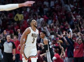 A fired-up CJ McCollum from the New Orleans Pelicans acknowledges the feisty crowd at Smoothie King Center after he knocked down a 3-pointer against the San Antonio Spurs. (Image: Getty)