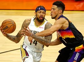 Brandon Ingram from the New Orleans Pelicans drives against Devin Booker from the Phoenix Suns prior to his injury in Game 2. (Image: Mark J. Rebilas/USA Today Sports)