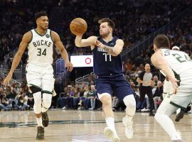 Giannis 'Greek Freak' Antetokounmpo from the Milwaukee Bucks slowly reacts to a pass from Luka Doncic of the Dallas Mavs. (Image: Getty)