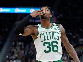 Marcus Smart from the Boston Celtics acknowledges the crowd at TD Garden in Boston during a recent victory. (Image: Jeff Chiu/AP)