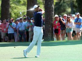 Bettors are rallying behind Tiger Woods as he prepares to play for the first time in over a year at the Masters this week. (Image: Andrew Redington/Getty)