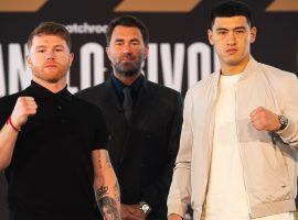 Canelo Alvarez (left) will move up in weight to take on light heavyweight champion Dmitry Bivol (right) in Las Vegas on Saturday night. (Image: Getty)