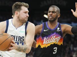 Chris Paul from the Phoenix Suns defends Luka Doncic of the Dallas Mavs in Game 2 of the Western Conference Semifinals. (Image: Getty)