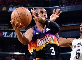 Chris Paul from the Phoenix Suns drives the lane against the New Orleans Pelicans in the first round of the 2022 NBA Playoffs. (Image: Getty)