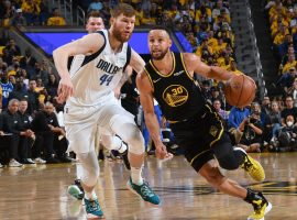 Steph Curry from the Golden State Warriors blows by Davis Bertans from the Dallas Mavs in the opening game of the Western Conference Finals at Chase Center. (Image: Noah Graham/Getty)