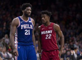 Joel Embiid from the Philadelphia 76ers hears a little trash talk from Jimmy Butler of the Miami Heat during the regular season, but Embiid is out the first two games of their postseason series. (Image: Mitchell Leff/Getty)
