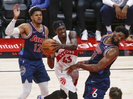 Philadelphia 76ers center Joel Embiid catches an errant elbow from Pascal Siakim of the Toronto Raptors in Game 6 of the first-round of the 2022 NBA Playoffs. (Image: Getty)