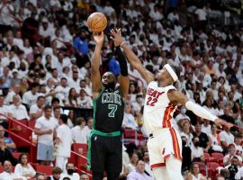 Jaylen Brown from the Boston Celtics pulls up for a 3-point shot over Jimmy Butler of the Miami Heat in Game 5 at the American Airlines Arena. (Image: Getty)