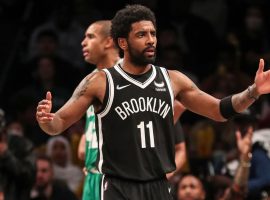 Kyrie Irving from the Brooklyn Nets contests a call from an official in the first round of the 2022 NBA playoffs against the Boston Celtics. (Image: Getty)