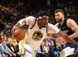 Center Kevin Looney from the Golden State Warriors blows by Maxi Kleber of the Dallas Mavs during a comeback in Game 2 at the Chase Center in San Francisco. (Image: Getty)