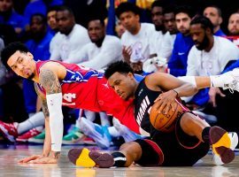 Kyle Lowry from the Miami Heat and Danny Green of the Philadelphia 76ers dive onto the floor for a loose ball in Game 4 of the Eastern Conference Semifinals. (Image: Matts Slocum/AP)