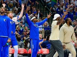 The Dallas Mavs bench have a lot of fun cheering on their team, as well as taunting the opposing team, but the NBA does not like their antics. (Image: Getty)