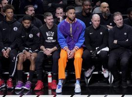 Ben Simmons sits on the bench at Barclay’s Center during a first-round playoff matchup between the Brooklyn Nets and Boston Celtics. (Image: John Minchillo/AP)