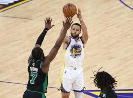 Steph Curry from the Golden State Warriors pulls up for a 3-pointer against Jaylen Brown of the Boston Celtics in the NBA Finals. (Image: Getty)