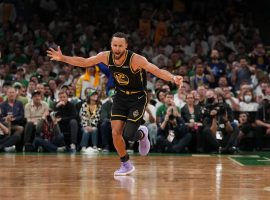 Steph Curry of the Golden State Warriors celebrates on of his seven 3-pointers in Game 4 of the NBA Finals when he dumped in 43 points against the Boston Celtics. (Image: Jesse Garrabrant/Getty)