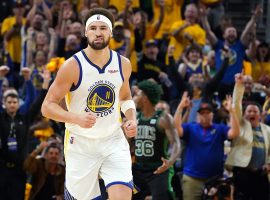 Klay Thompson snarls after he knocked down a 3-point shot to put the Golden State Warriors ahead of the Boston Celtics in Game 5 of the NBA Finals at Chase Center. (Image: USA Today Sports)