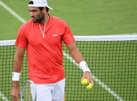 Matteo Berrettini withdrew from Wimbledon before his first-round match after testing positive for COVID-19. (Image: Neil Hall/EPA)