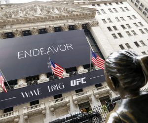 Endeavor lowers bid for OpenBet after market correction.