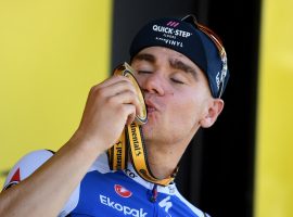 Fabio Jakobsen from QuickStep-AlphaVinyl on the podium during the winner's ceremony after a victory in Stage 2 of the 2022 Tour de France in Nyborg. (Image: Annegret Hilse/Reuters)