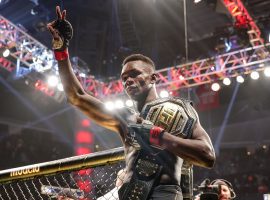 Israel Adesanya (pictured) will defend his middleweight title against Jared Cannonier at UFC 276 on Saturday. (Image: Carmen Mandato/Getty)