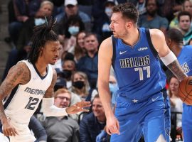 Ja Morant from the Memphis Grizzlies defends Luka Doncic of the Dallas Mavs in a battle between the top two teams in the Southwest Division. (Image: Getty)