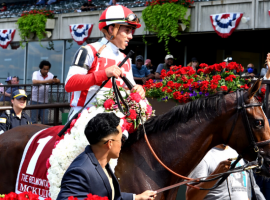 To the victor goes the flower blanket. McKulick and jockey Irad Ortiz Jr. bask in the Belmont Park winner's circle after winning the Grade 1 Belmont Oaks Saturday. (Image: SR Photo)