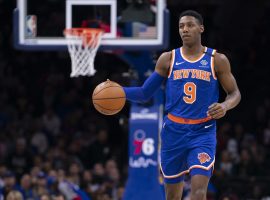 RJ Barrett from the New York Knicks brings the ball up the court at Wells Fargo Center in Philadelphia. (Image: Mitchell Leff/Getty)