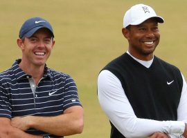 Rory McIlroy (left) is among those who think Tiger Woods (right) has a chance to win this week at the 150th Open Championship. (Image: Getty)