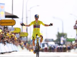 Wou van Aert crosses the finish line in Calais to win Stage 4 of the 2022 Tour de France. (Image: Getty)