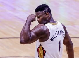 Zion Williamson from the New Orleans Pelicans flexes after hitting a shot against the Los Angeles Lakers in 2021. (Image: Getty)