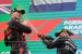 The Hungarian GP second place finisher. Lewis Hamilton, sprays winner Max Verstappen with champagne on Sunday. Two days later Hamilton announced his ownership stake in the Denver Broncos. (Image: Reuters)